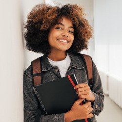 Closeup of student smiling on campus